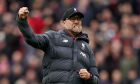 FILE - Liverpool's manager Jurgen Klopp celebrates at the end of the English Premier League soccer match between Liverpool and Bournemouth at Anfield stadium in Liverpool, England, March 7, 2020. Jurgen Klopp announced Friday Jan. 26, 2024, he will step down as Liverpool manager at end of this season. (AP Photo/Jon Super, File)