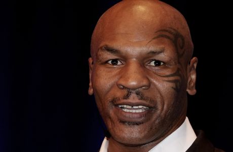 BRISBANE, AUSTRALIA - NOVEMBER 16:  Mike Tyson speaks on stage during his speaking tour, "Day of the Champions" at the Brisbane Convention & Exhibition Centre on November 16, 2012 in Brisbane, Australia.  (Photo by Chris Hyde/Getty Images)