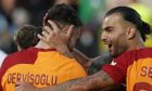 Galatasaray's Halil Dervisoglu, left, celebrates after scoring his side's second goal with Abdulkerim Bardakci during the Champions League, second qualifying round, first leg soccer match between Zalgiris and Galatasaray at the LFF stadium in Vilnius, Lithuania, Tuesday, July 25, 2023. (AP Photo/Mindaugas Kulbis)