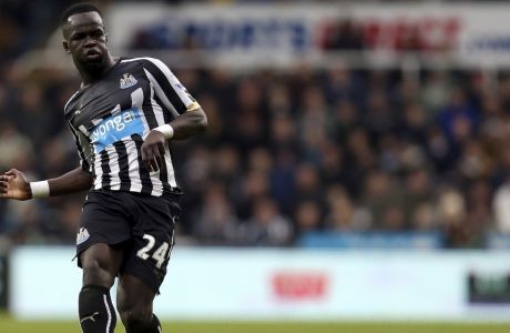 FILE - In this Saturday, Dec. 6, 2014 file photo, Newcastle United's Cheick Tiote plays the ball forward during their English Premier League soccer match against Chelsea at St James' Park, Newcastle, England. Cheick Tiote, a former Newcastle and Ivory Coast midfielder, has died after collapsing in training with a Chinese team it was announced on Monday, June 5, 2017. He was 30. (AP Photo/Scott Heppell, file)