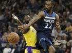 Minnesota Timberwolves' Andrew Wiggins tries to pass the ball over Los Angeles Lakers' Lance Stephenson in the first half of an NBA basketball game Sunday, Jan. 6, 2019, in Minneapolis. (AP Photo/Stacy Bengs)