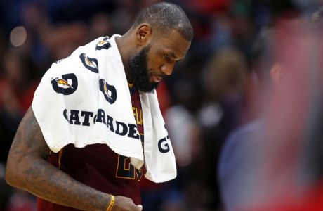 Cleveland Cavaliers forward LeBron James, walks to the bench during a timeout in the second half of an NBA basketball game against the New Orleans Pelicans in New Orleans, Saturday, Oct. 28, 2017. The Pelicans won 123-101. (AP Photo/Gerald Herbert)