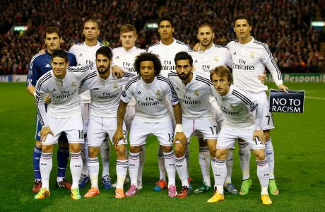 The Real Madrid team pose for a group photo before the Champions League group B soccer match between Liverpool and Real Madrid at Anfield Stadium, Liverpool, England, Wednesday Oct. 22, 2014. (AP Photo/Jon Super)  
