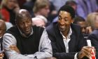 Chicago Bulls' greats Michael Jordan, left, and Scottie Pippen sit court side during the first half of an NBA basketball game between the Chicago Bulls and the Charlotte Bobcats Tuesday, Feb. 15, 2011, in Chicago. (AP Photo/Charles Rex Arbogast)