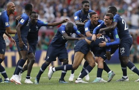 French players celebrate at the end of the final match between France and Croatia at the 2018 soccer World Cup in the Luzhniki Stadium in Moscow, Russia, Sunday, July 15, 2018. France won 4-2. (AP Photo/Petr David Josek)