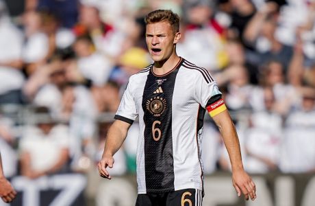 Germany's Joshua Kimmich reacts during a friendly soccer match between Germany and Ukraine in Bremen, Germany, Monday, June 12, 2023. It is the 1000st match for the German national soccer team. (AP Photo/Martin Meissner)