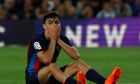 Barcelona's Pedri reacts after a missed scoring opportunity during a Spanish La Liga soccer match between Barcelona and Osasuna at the Camp Nou stadium in Barcelona, Spain, Tuesday, May 2, 2023. (AP Photo/Joan Monfort)