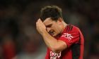 Manchester United's Harry Maguire gestures during the English League Cup third round soccer match between Manchester United and Crystal Palace at Old Trafford stadium in Manchester, England, Tuesday, Sept. 26, 2023. (AP Photo/Dave Thompson)