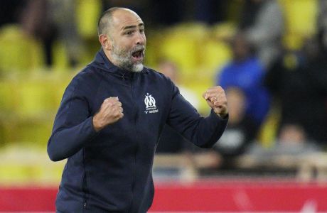 Marseille's head coach Igor Tudor celebrates after the French League One soccer match between Monaco and Marseille at the Stade Louis II in Monaco, Sunday, Nov. 13, 2022. (AP Photo/Daniel Cole)