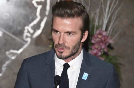 UNICEF Goodwill Ambassador David Beckham lights the Empire State Building in honor of UNICEF's 70th anniversary on Monday, Dec. 12, 2016, in New York. (Photo by Evan Agostini/Invision/AP)