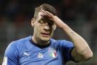 Italy's Andrea Belotti reacts after a missed chance during the World Cup qualifying play-off second leg soccer match between Italy and Sweden, at the Milan San Siro stadium, Italy, Monday, Nov. 13, 2017. (AP Photo/Luca Bruno)