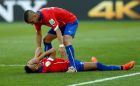 BELO HORIZONTE, BRAZIL - JUNE 28: Alexis Sanchez of Chile is consoled by his teammate Felipe Gutierrez after the defeat in the 2014 FIFA World Cup Brazil Round of 16 match between Brazil and Chile at Estadio Mineirao on June 28, 2014 in Belo Horizonte, Brazil.  (Photo by Ryan Pierse - FIFA/FIFA via Getty Images)