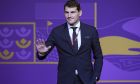 Former Spanish soccer international Iker Casillas waves as he arrives for the 2022 soccer World Cup draw at the Doha Exhibition and Convention Center in Doha, Qatar, Friday, April 1, 2022. (AP Photo/Darko Bandic)