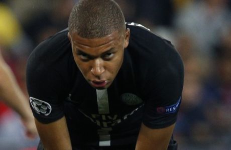 PSG forward Kylian Mbappe reacts during the Champions League Group C soccer match between Paris Saint-Germain and Red Star at Parc des Prince stadium in Paris, Wednesday, Oct. 3, 2018. (AP Photo/Thibault Camus)