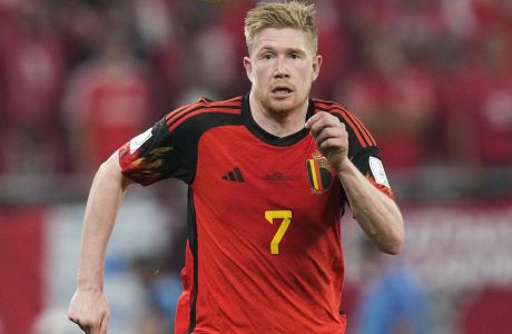 Belgium's Kevin De Bruyne eyes the ball during the World Cup group F soccer match between Belgium and Canada, at the Ahmad Bin Ali Stadium in Doha, Qatar, Wednesday, Nov. 23, 2022. (AP Photo/Darko Bandic)