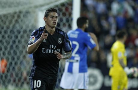 Real Madrid's James Rodriguez celebrates after scoring the opening goal against Leganes during a Spanish La Liga soccer match between Leganes and Real Madrid at the Butarque stadium in Madrid, Wednesday, April 5, 2017. (AP Photo/Francisco Seco)