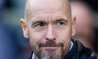 Manchester United's head coach Erik ten Hag waits for the start of the English Premier League soccer match between Fulham and Manchester United, at Craven Cottage, London, Saturday, Nov. 4, 2023. (AP Photo/David Cliff)