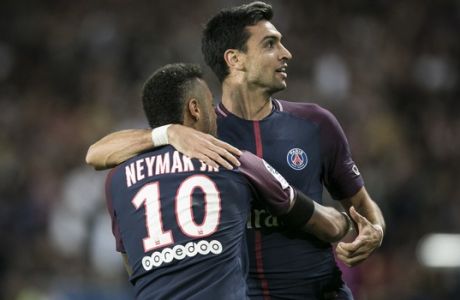 PSG's Javier Pastore, right, and PSG's Neymar celebrate after scoring against Toulouse during the French League One soccer match between PSG and Toulouse at the Parc des Princes stadium in Paris, France, Sunday, Aug. 20, 2017. (AP Photo/Kamil Zihnioglu)