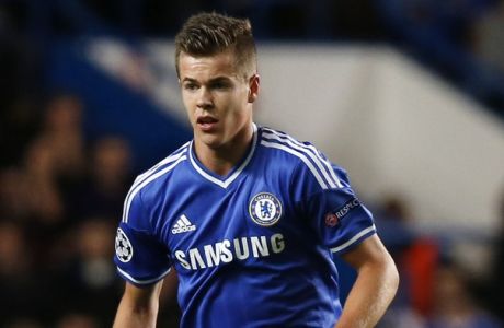 Chelsea's Marco van Ginkel plays against Basel during their Champions League group E soccer match at Stamford Bridge stadium in London, Wednesday, Sept. 18, 2013. (AP Photo/Sang Tan)