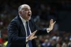 Real coach Pablo Laso gives instructions to his players during the Euroleague Final Four Championship basketball match between Real Madrid and Olympiacos in Madrid, Spain, Sunday, May 17, 2015. (AP Photo/Daniel Ochoa de Olza)
