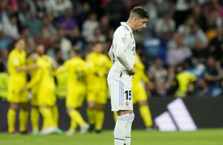 Real Madrid's Federico Valverde reacts after Villarreal's Jose Luis Morales scored his side's second goal during a Spanish La Liga soccer match between Real Madrid and Villarreal at the Santiago Bernabeu stadium in Madrid, Saturday, April 8, 2023. (AP Photo/Jose Breton)