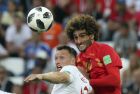 England's Ashley Young, left, and Belgium's Marouane Fellaini challenge for the ball during the group G match between England and Belgium at the 2018 soccer World Cup in the Kaliningrad Stadium in Kaliningrad, Russia, Thursday, June 28, 2018. (AP Photo/Czarek Sokolowski)