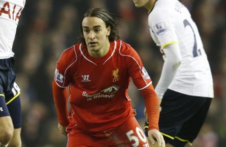 Liverpool's Lazar Markovic, center, is challenged for the ball by Tottenham's Harry Kane and Christian Eriksen, right, during the English Premier League soccer match between Liverpool and Tottenham Hotspur at Anfield Stadium, Liverpool, England, Tuesday Feb. 10, 2015. (AP Photo/Jon Super)