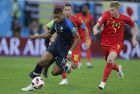 France's Kylian Mbappe, left, runs past Belgium's Kevin De Bruyne during the semifinal match between France and Belgium at the 2018 soccer World Cup in the St. Petersburg Stadium, in St. Petersburg, Russia, Tuesday, July 10, 2018. (AP Photo/Petr David Josek)