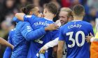 Everton players celebrate their victory at the English Premier League soccer match between Everton and Arsenal at Goodison Park in Liverpool, England, Saturday, Feb. 4, 2023. (AP Photo/Jon Super)