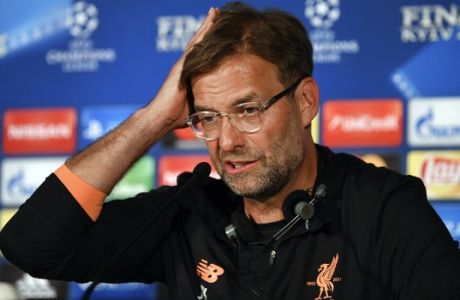 Liverpool coach Juergen Klopp during a press conference at the Olympic stadium in Kiev, Ukraine, Friday, May 25, 2018 ahead of the Champions League final soccer match between Real Madrid and Liverpool on Saturday May 26. (UEFA Pool via AP)