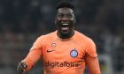Inter Milan's goalkeeper Andre Onana celebrates at the end of the Champions League group C soccer match between Inter Milan and Barcelona at the San Siro stadium in Milan, Italy, Tuesday, Oct. 4, 2022. (AP Photo/Luca Bruno)