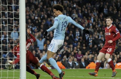 Manchester City's Leroy Sane, 19, hits a goal that was disallowed during the Champions League quarterfinal second leg soccer match between Manchester City and Liverpool at Etihad stadium in Manchester, England, Tuesday, April 10, 2018. (AP Photo/Rui Vieira)