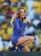 SAO PAULO, BRAZIL - JUNE 12:  Signer Claudia Leitte performs during the Opening Ceremony of the 2014 FIFA World Cup Brazil prior to the Group A match between Brazil and Croatia at Arena de Sao Paulo on June 12, 2014 in Sao Paulo, Brazil.  (Photo by Adam Pretty/Getty Images)