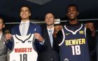 From left to right, Thomas Welsh, one of the Denver Nuggets' two second-round picks in the NBA Draft, joins Josh Kroenke, team president and governor, first-round pick Michael Porter Jr., team general manager Arturas Karnisovas, the other second-round pick, Jarred Vanderbilt and Tim Connelly, the team's president of basketball operations, during a photo opportunity during a news conference to introduce the players to the media Friday, June 22, 2018, in Denver. (AP Photo/David Zalubowski)