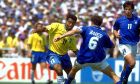 Brazil's Romario (11), center, is challenged by Italian defender Franco Baresi (6) during World Cup Final match July 17, 1994 at the Rose Bowl in Pasadena.  (AP Photo/Carlo Fumagalli)