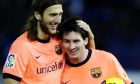 FC Barcelona's Lionel Messi of Argentina, right, reacts with his teammate Dimitro Chygrynskiy of the Ukraine after his hat-trick, during a Spanish La Liga soccer match against Tenerife,  at the Heliodoro Rodriguez Lopez stadium on the Canary Island of Santa Cruz de Tenerife, Spain, Sunday, Jan. 10, 2010. (AP Photo/Manu Fernandez)