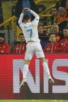 Real Madrid's Cristiano Ronaldo celebrates scoring his side's third goal during a Champions League Group H soccer match between Borussia Dortmund and Real Madrid at the BVB stadium in Dortmund, Germany, Tuesday, Sept. 26, 2017. (AP Photo/Michael Probst)