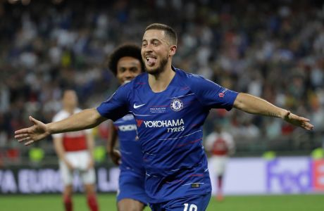 FILE - Chelsea's Eden Hazard celebrates after scoring his side's fourth goal during the Europa League Final soccer match between Arsenal and Chelsea at the Olympic stadium in Baku, Azerbaijan, Wednesday, May 29, 2019. Eden Hazard announced his retirement from all soccer on Tuesday, Oct. 10, 2023. The 32-year-old Hazard is putting an end to a 16-year-old injury-hit career marked by success at club level and unfulfilled promise with the Belgium national team's Golden Generation. (AP Photo/Luca Bruno, File)