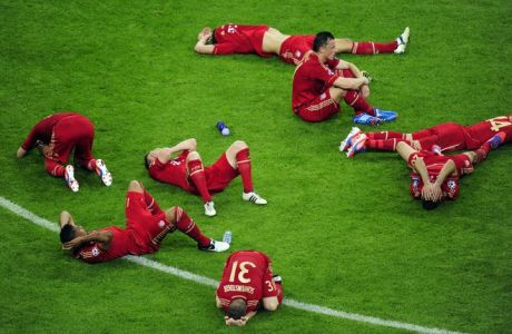 Players of Bayern Munich lay on the pitch after the UEFA Champions League final football match between FC Bayern Muenchen and Chelsea FC on May 19, 2012 at the Fussball Arena stadium in Munich. AFP PHOTO / JOHN MACDOUGALLJOHN MACDOUGALL/AFP/GettyImages