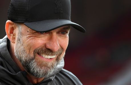 Liverpool's manager Jurgen Klopp before the English Premier League soccer match between Liverpool and Brighton & Hove Albion at Anfield, in Liverpool, England, Sunday March 31, 2024. (AP Photo/Rui Vieira)