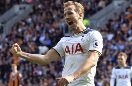 Tottenham Hotspur's Harry Kane celebrates scoring his side's third goal against Hull City during the English Premier League soccer match at the KCOM Stadium, Hull, England, Sunday May 21, 2017. (Danny Lawson/PA via AP)