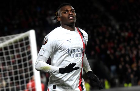 AC Milan's Rafael Leao celebrates after scoring against Rennes during the Europa League soccer match between Rennes and AC Milan at the Roazhon Park stadium in Rennes, western France, Thursday, Feb. 22, 2024. (AP Photo/Mathieu Pattier)