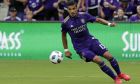 Orlando City's Mohamed El-Munir (13) moves the ball against Real Salt Lake during the second half of an MLS soccer match, Sunday, May 6, 2018, in Orlando, Fla. (AP Photo/John Raoux)