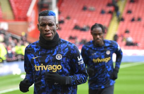 Chelsea's Nicolas Jackson warms up prior to the English Premier League soccer match between Sheffield United and Chelsea at Bramall Lane stadium in Sheffield, England, Sunday, April 7, 2024. (AP Photo/Rui Vieira)