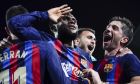 Barcelona's Franck Kessie, centre, celebrates with teammates after scoring his team's second goal during the Spanish La Liga soccer match between Barcelona and Real Madrid at Camp Nou stadium in Barcelona, Spain, Sunday, March 19, 2023. (AP Photo/Joan Mateu)