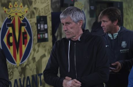 Villarreal's coach Quique Setien walks out for the Conference League Round of 16, 2nd leg soccer match between Villarreal and Anderlecht at the Ceramica stadium in Villarreal, Spain,Thursday, March 16, 2023. (AP Photo/Alberto Saiz)