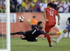 FILE - In this Sunday, June 12, 2016 file photo, Peru's Raul Ruidiaz, right, scores a goal past Brazil's goalkeeper Alisson in their Copa America Group B soccer match in Foxborough, Mass. A decade before becoming footballs most expensive goalkeeper in history, Brazils and Liverpools Alisson Becker was actually thinking of hanging his gloves. At age 15, he was a chubby teenager on the shadows of older brother Muriel at his boyhood club Internacional in Southern Brazil. (AP Photo/Charles Krupa, file)
