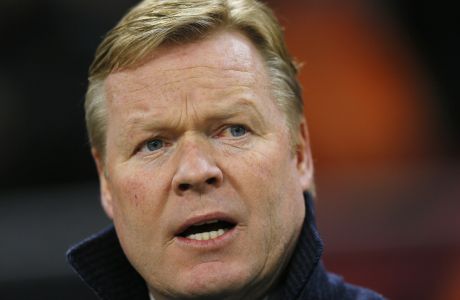 FILE- Netherlands coach Ronald Koeman stands prior to the start of the Euro 2020 group C qualifying soccer match between Netherlands and Germany at the Johan Cruyff ArenA in Amsterdam, Sunday, March 24, 2019. Ronald Koeman will return as coach of the Netherlands team after the World Cup in Qatar, the country's soccer association announced Wednesday. Koeman, who quit as national coach in 2020 to join Barcelona, will take over from Louis van Gaal, whose contract runs through the World Cup. (AP Photo/Peter Dejong, File)