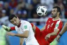 Serbia's Luka Milivojevic, right, and Switzerland's Blerim Dzemaili vie for the ball during the group E match between Switzerland and Serbia at the 2018 soccer World Cup in the Kaliningrad Stadium in Kaliningrad, Russia, Friday, June 22, 2018. (AP Photo/Victor Caivano)