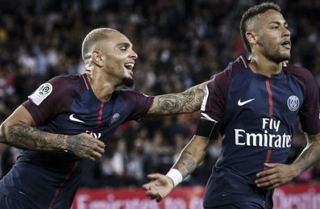 PSG's Neymar, right, and PSG's Layvin Kurzawa after scoring against Toulouse during the French League One soccer match between PSG and Toulouse at the Parc des Princes stadium in Paris, France, Sunday, Aug. 20, 2017. (AP Photo/Kamil Zihnioglu)